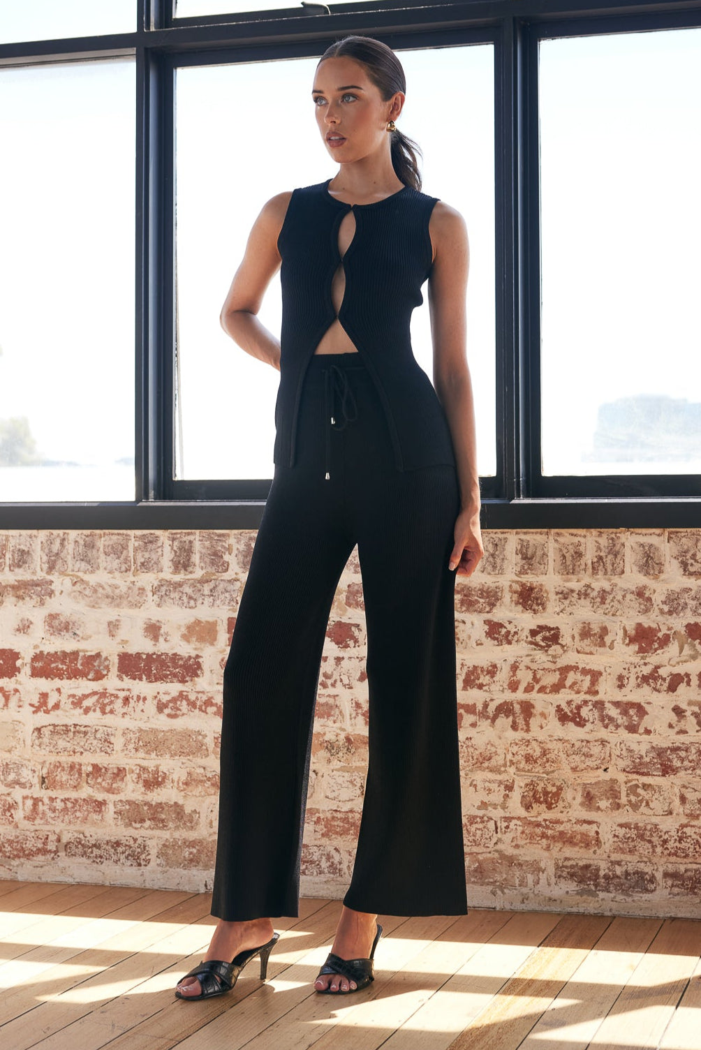 TH24015 Liv Sleeveless Ribbed Knit Top With Front Eye Hook in Black. WHOLESALE KNITWEAR Collection by Rosebullet The Label, a Melbourne based women's fashion wholesaler and manufacturer. 