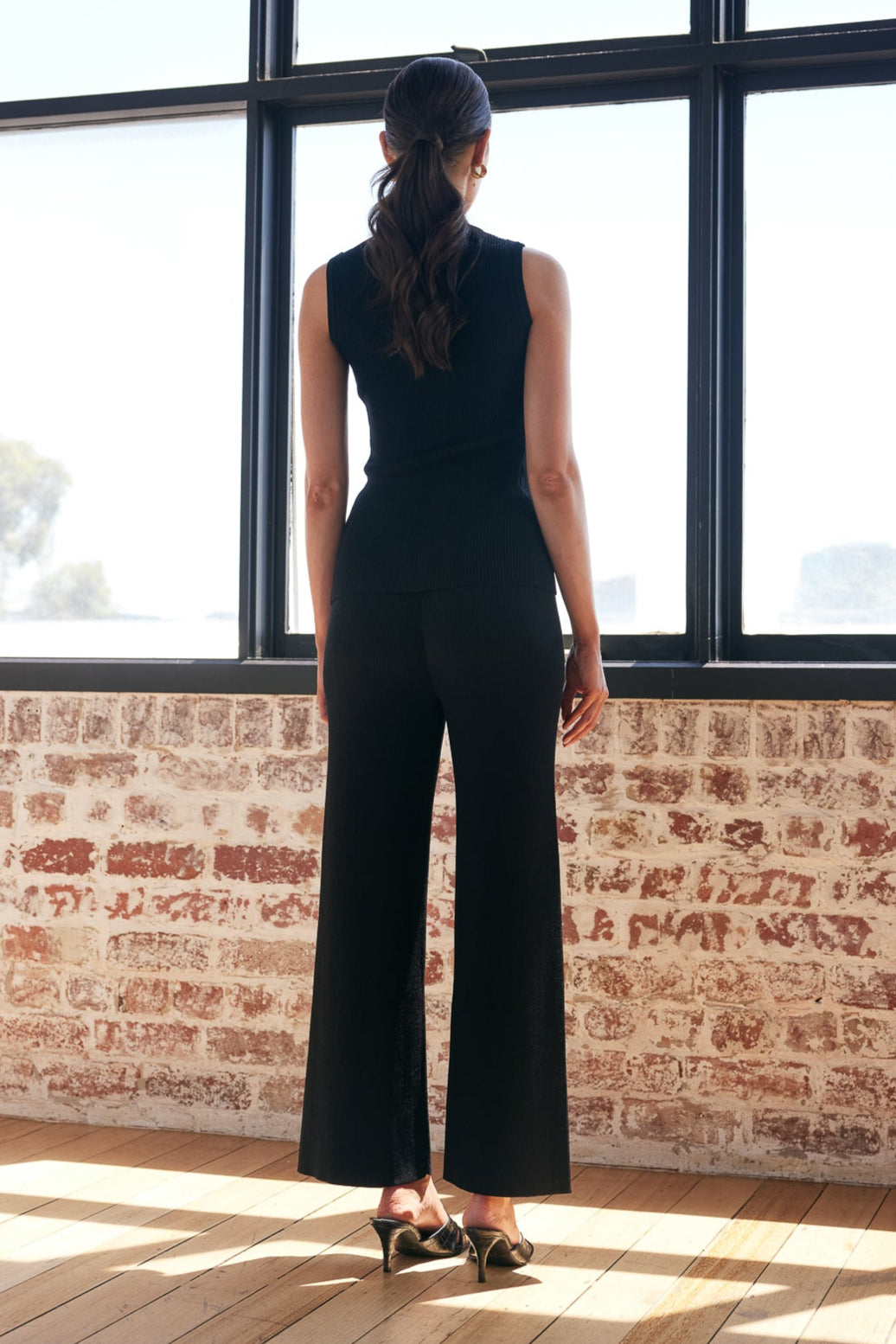 TH24015 Liv Sleeveless Ribbed Knit Top With Front Eye Hook in Black. WHOLESALE KNITWEAR Collection by Rosebullet The Label, a Melbourne based women's fashion wholesaler and manufacturer. 