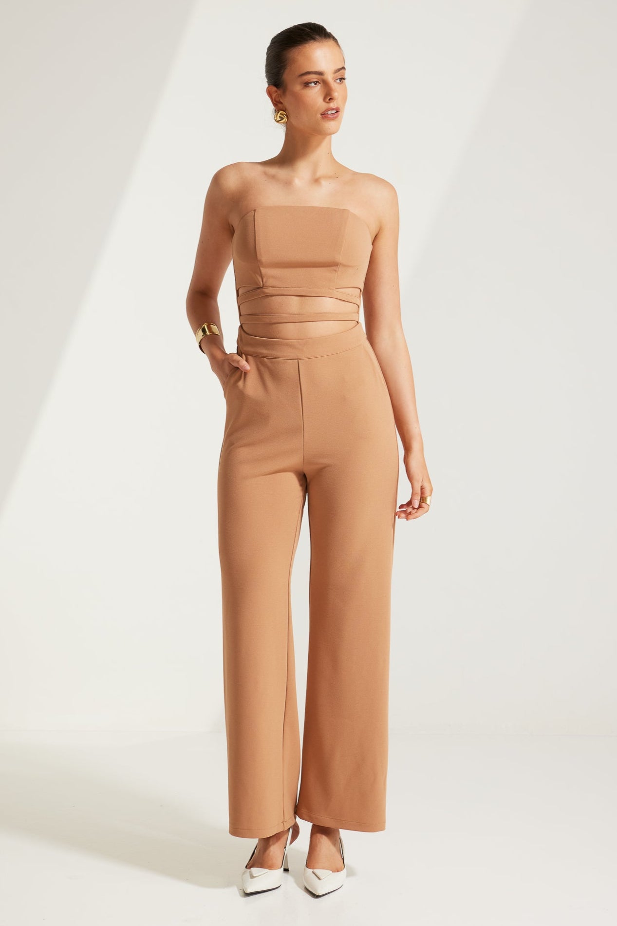 TL9072-A Aliyah Cut Out Straight Leg Jumpsuit Tan. Australian women’s WHOLESALE PLAYSUITS/JUMPSUITS fashion from Rosebullet the label. Strapless Cut out jumpsuit.