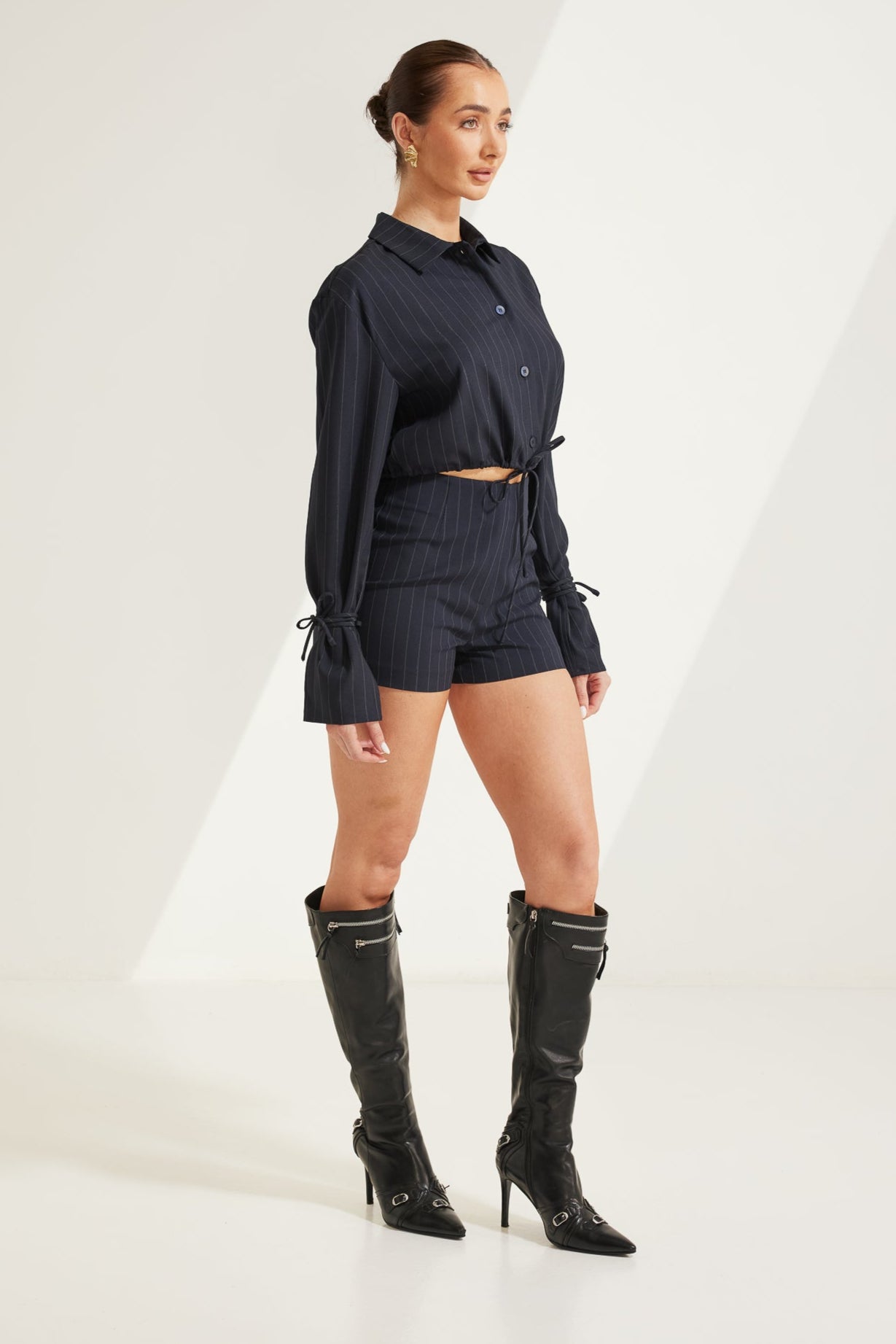 TT9788 Scottie Pinstripe Shorts in Navy/White. Australian women’s WHOLESALE SHORTS. High waisted short in Classic pinstripe pattern. This short come in matching top.