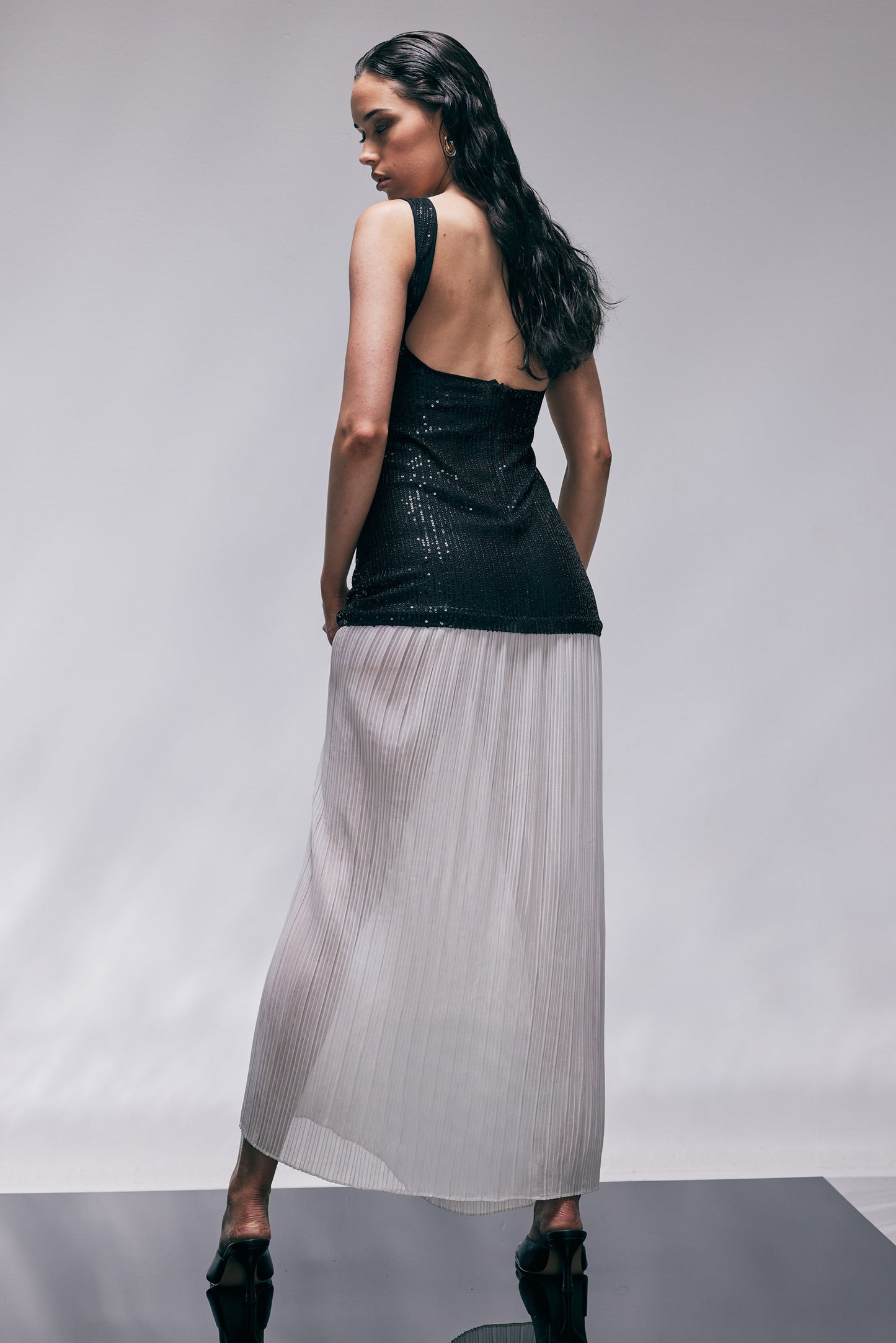 TT9808 Sequin Maxi Dress Black. Australian women’s fashion brand Rosebullet The Label Wholesale Collection, featuring trend driven dresses, tops, pants, skirts, skorts, shorts, knitwear, jumpsuits, playsuits, outerwear, restocked bestsellers, and more for modern boutiques.