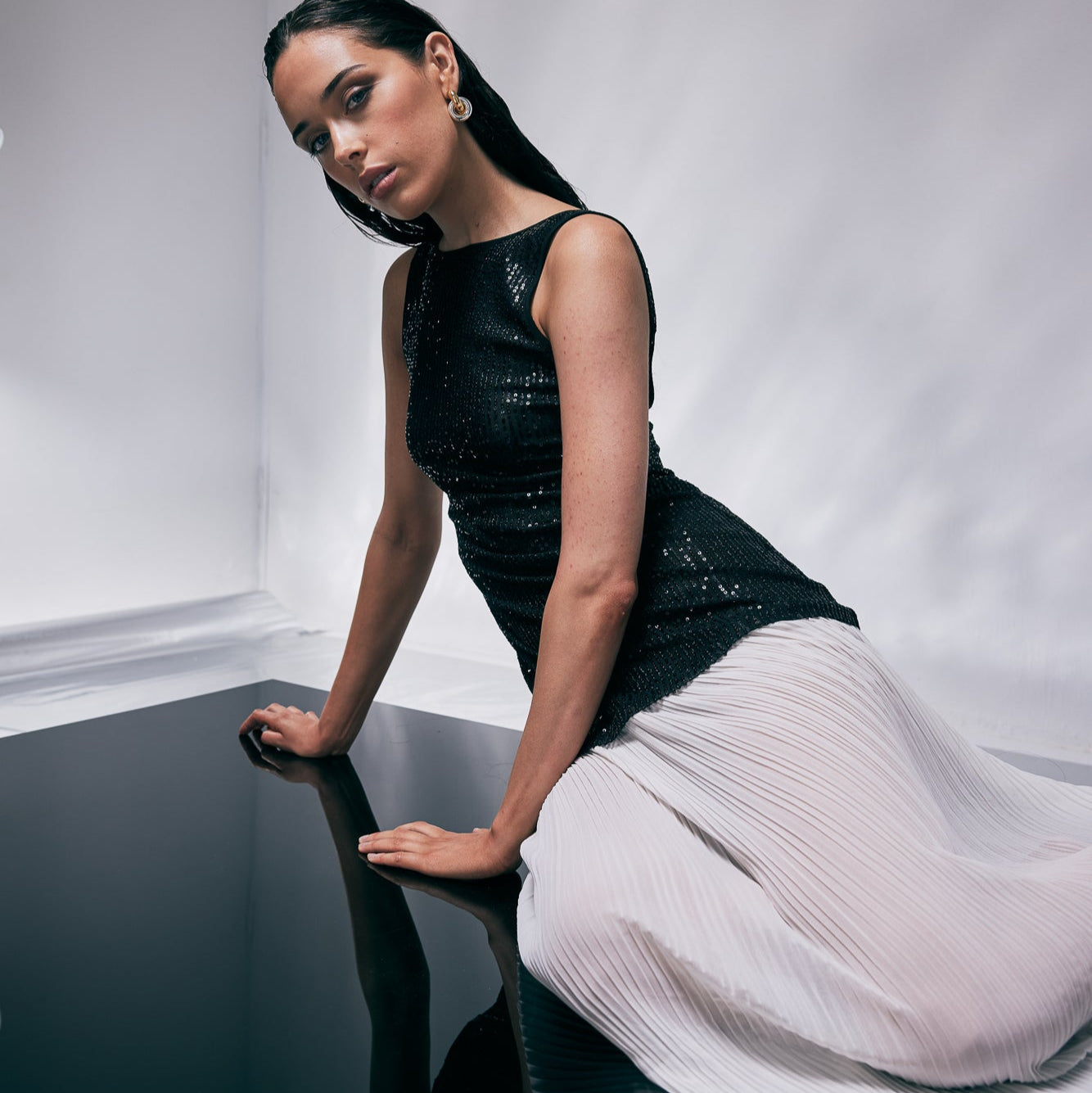 TT9808 Sequin Maxi Dress Black. Australian women’s fashion brand Rosebullet The Label Wholesale Collection, featuring trend driven dresses, tops, pants, skirts, skorts, shorts, knitwear, jumpsuits, playsuits, outerwear, restocked bestsellers, and more for modern boutiques.