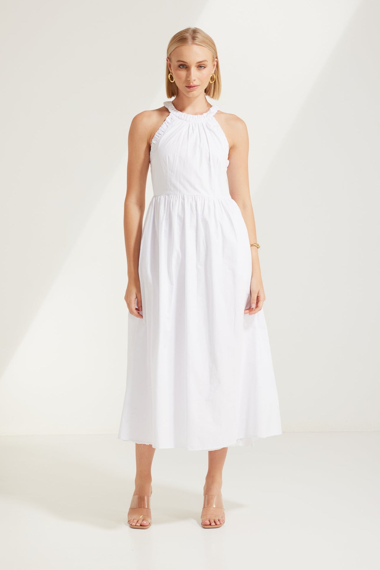 TW3932 Elaina Race Neckline Dress in White. WHOLESALE MIDI DRESSES from Rosebullet The Label, a Melbourne based women's fashion wholesaler and manufacturer. Designed for every occasion, from casual dresses and weekend getaways to parties.
