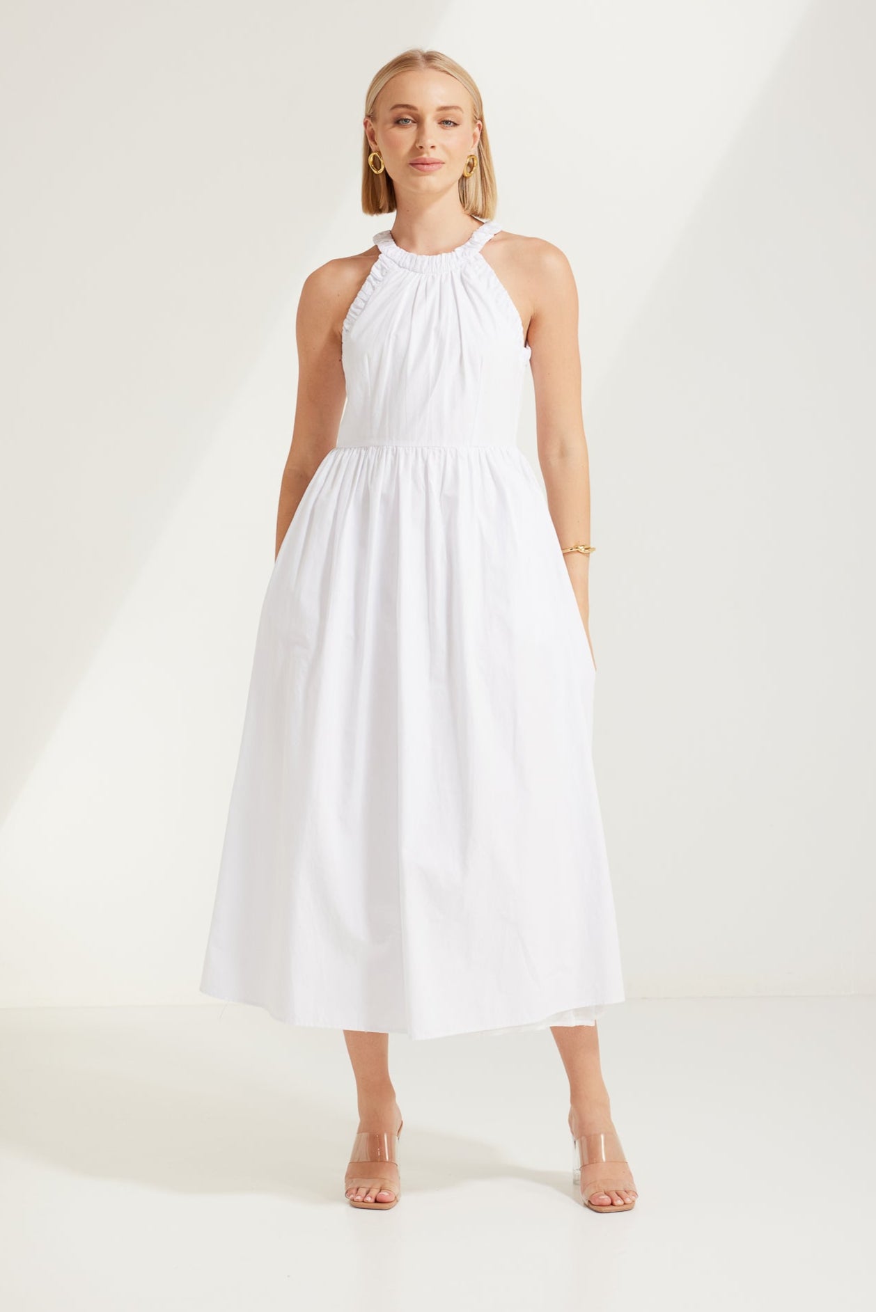 TW3932 Elaina Race Neckline Dress in White. WHOLESALE MIDI DRESSES from Rosebullet The Label, a Melbourne based women's fashion wholesaler and manufacturer. Designed for every occasion, from casual dresses and weekend getaways to parties.