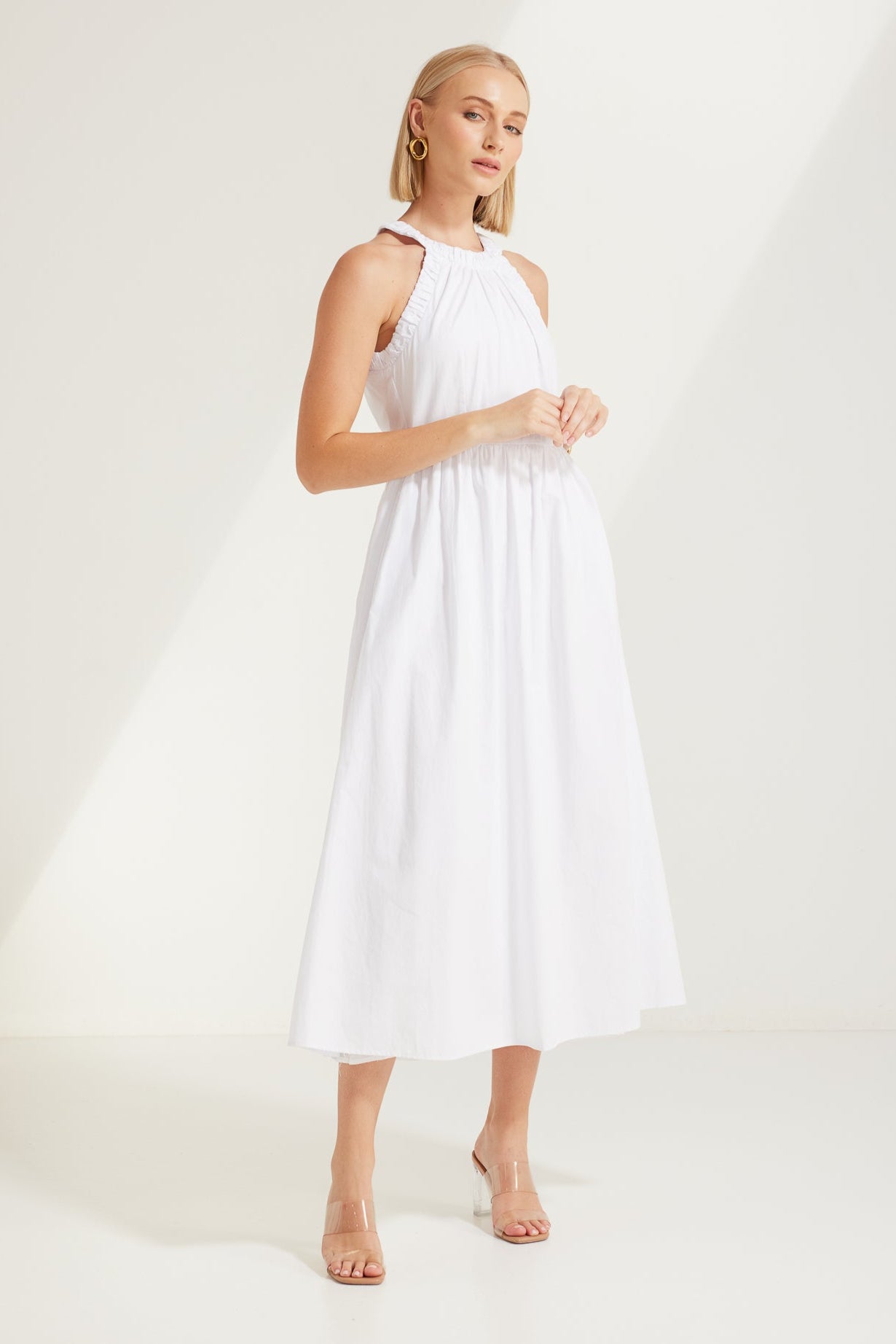 TW3932 Elaina Race Neckline Dress in White. WHOLESALE MIDI DRESSES from Rosebullet The Label, a Melbourne based women's fashion wholesaler and manufacturer. Designed for every occasion, from casual dresses and weekend getaways to parties.