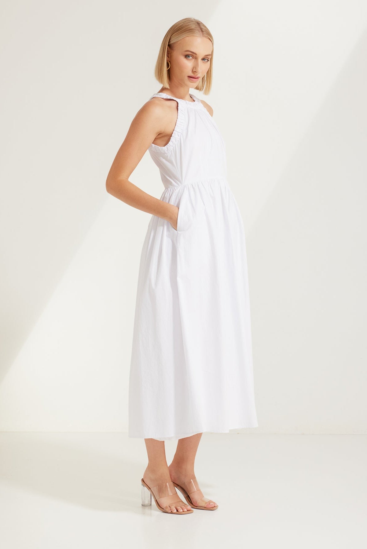 TW3932 Elaina Race Neckline Dress in White. WHOLESALE MIDI DRESSES from Rosebullet The Label, a Melbourne based women's fashion wholesaler and manufacturer. Designed for every occasion, from casual dresses and weekend getaways to parties.