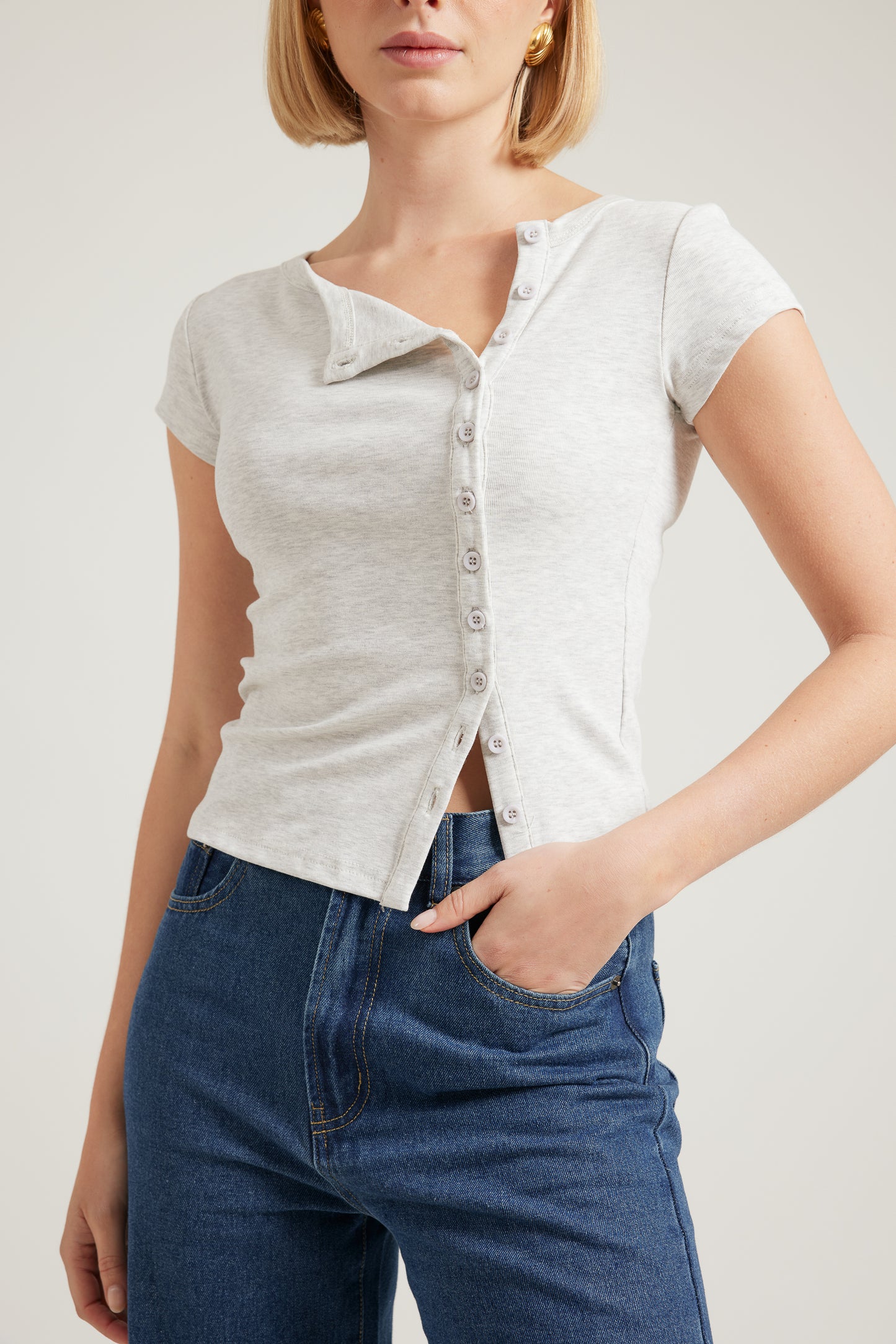 TW4586 Tru Buttons Down T Shirt in Light Grey. Australian women’s fashion brand BACK TO BASICS WHOLESALE FASHION COLLECTION. BACK TO BASICS is all about elevated essentials think comfy, easy to wear pieces that still look effortlessly stylish. Designed for your everyday life, our collections bring you relaxed, go to staples you’ll reach for again and again.by rosebullet the label