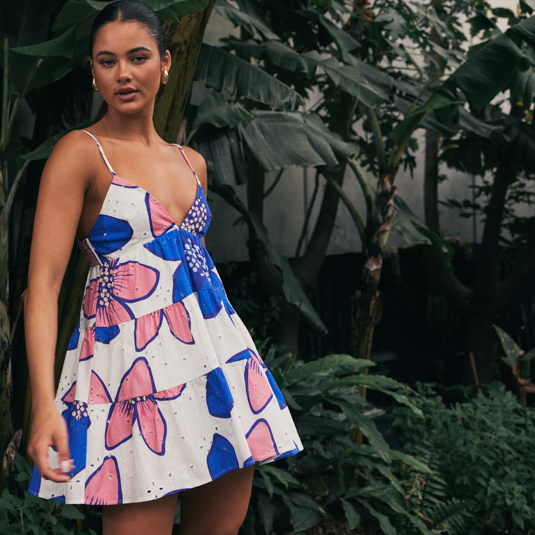 TW4600A Botanic Eyelet Bloom Tiered Mini Dress. Australian women’s fashion brand Rosebullet The Label Wholesale Collection, featuring trend driven dresses, tops, pants, skirts, skorts, shorts, knitwear, jumpsuits, playsuits, outerwear, restocked bestsellers, and more for modern boutiques.