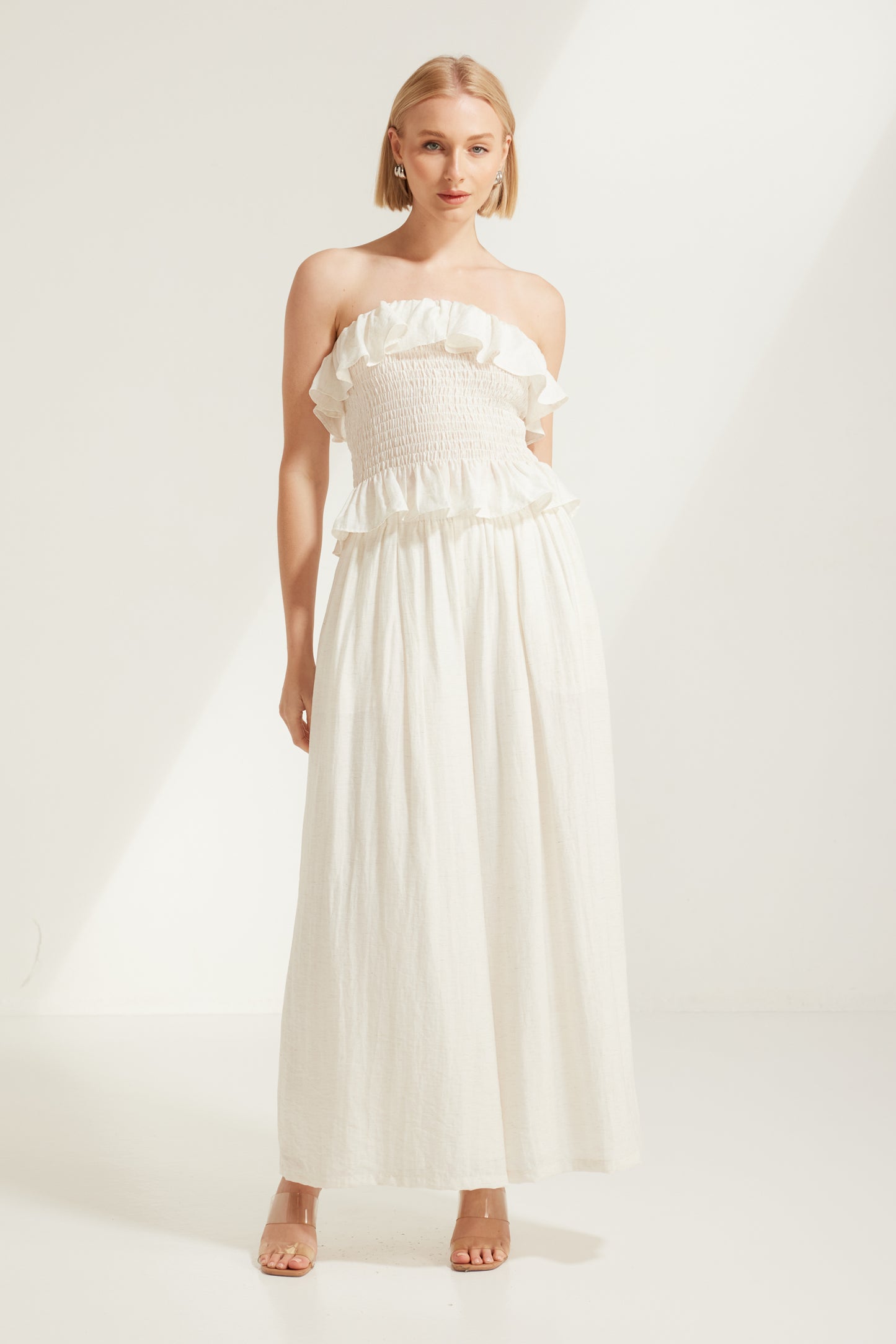 TW4793 Celina Shirred Ruffle Top Natural Ivory. Australian women’s WHOLESALE SLEEVELESS TOPS. Matching set come in Shirred body top and wide leg pant.