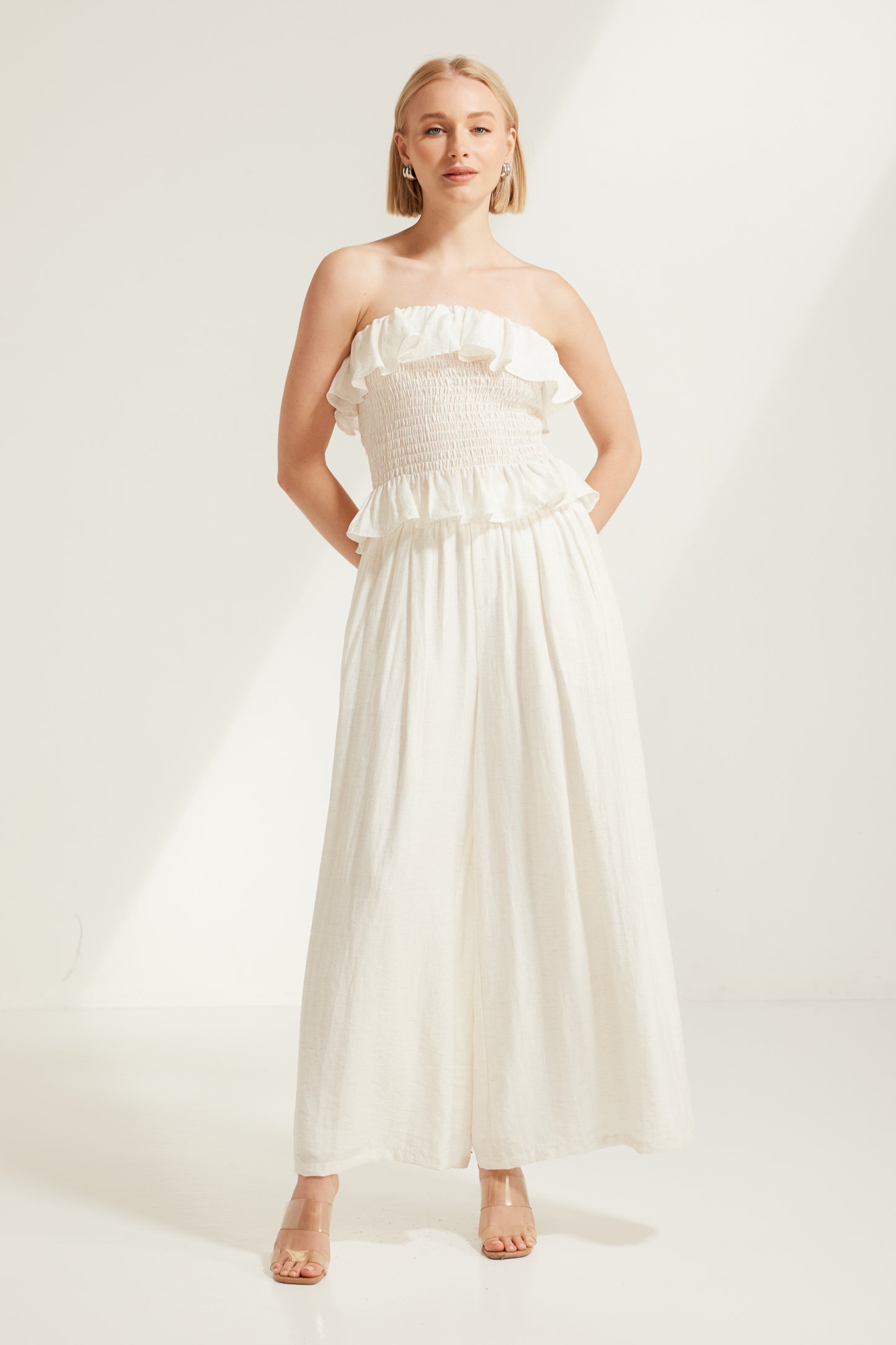 TW4793 Celina Shirred Ruffle Top Natural Ivory. Australian women’s WHOLESALE SLEEVELESS TOPS. Matching set come in Shirred body top and wide leg pant.