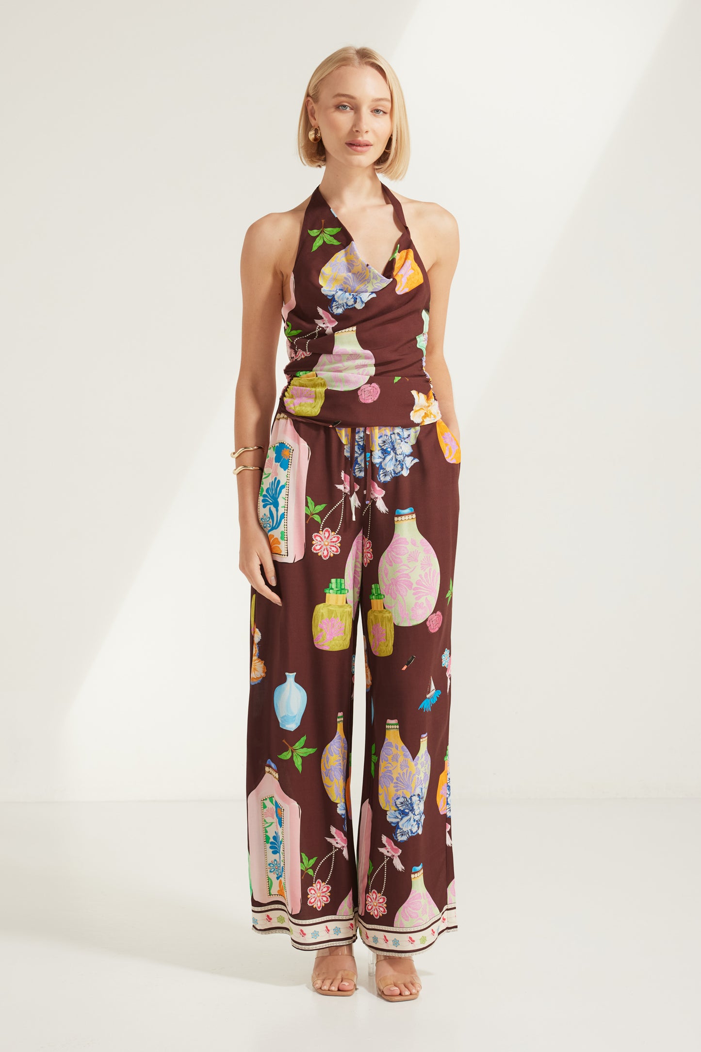 TW4856A Perfume Dreams Halter Neck Top Chocolate Print. Australian women’s PARAISO WHOLESALE FASHION COLLECTION fashion from Rosebullet the label. Paraiso is a fresh new label designed for the dreamers, the beach lovers, and the laid-back souls. Inspired by the feeling of being on holiday, we create breezy, relaxed pieces that are easy to wear and made to flatter every body and inspire confidence in every moment.