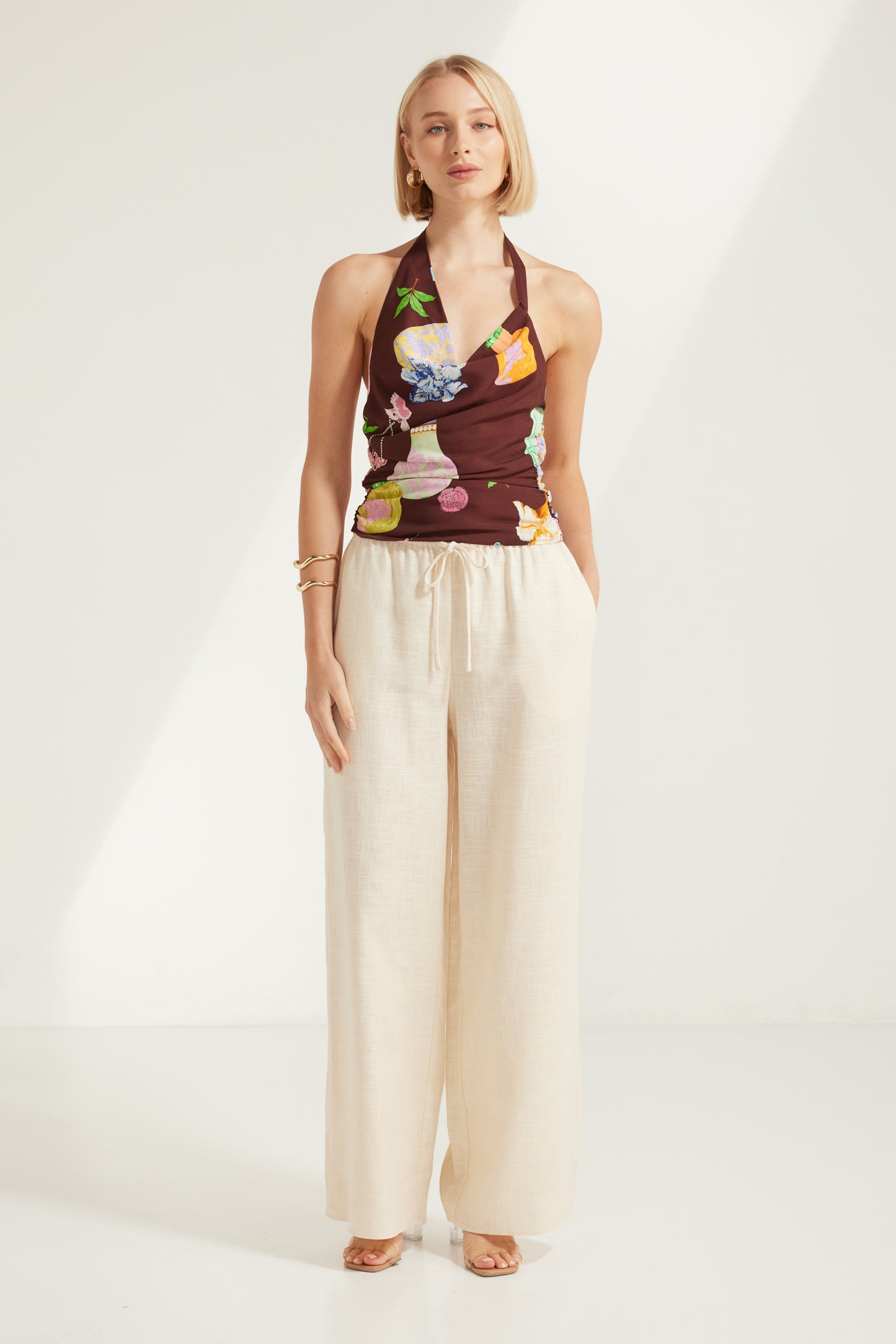TW4856A Perfume Dreams Halter Neck Top Chocolate Print. Australian women’s PARAISO WHOLESALE FASHION COLLECTION fashion from Rosebullet the label. Paraiso is a fresh new label designed for the dreamers, the beach lovers, and the laid-back souls. Inspired by the feeling of being on holiday, we create breezy, relaxed pieces that are easy to wear and made to flatter every body and inspire confidence in every moment.