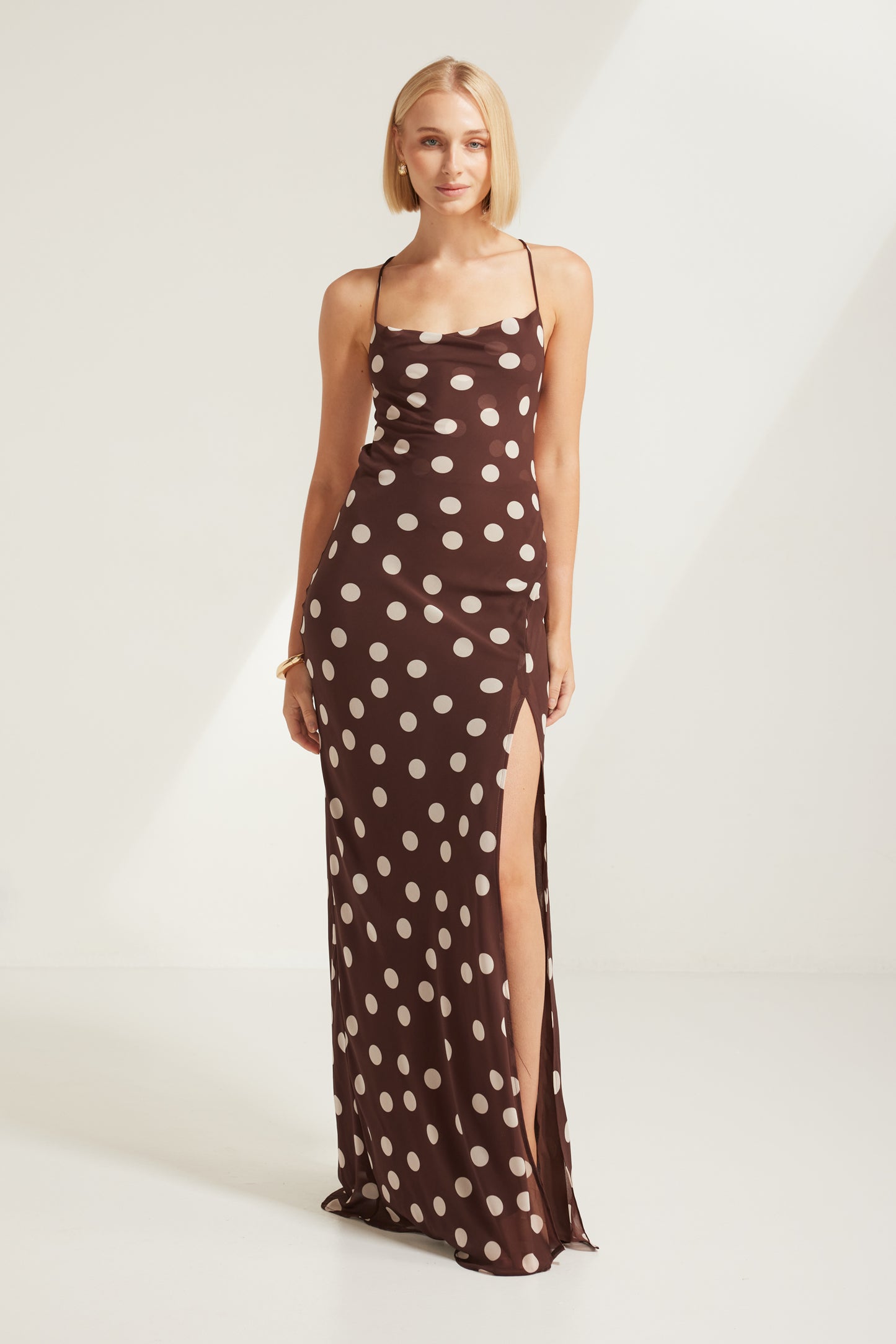TW4867 Cocoa Dot Edit Backless Maxi Dress in Choco/Beige. Wholesale dresses from Rosebullet The Label, a Melbourne based women's fashion wholesaler and manufacturer. Featuring elevated styles for every occasion, from casual dresses and workwear to parties, events, holidays, and evening wear