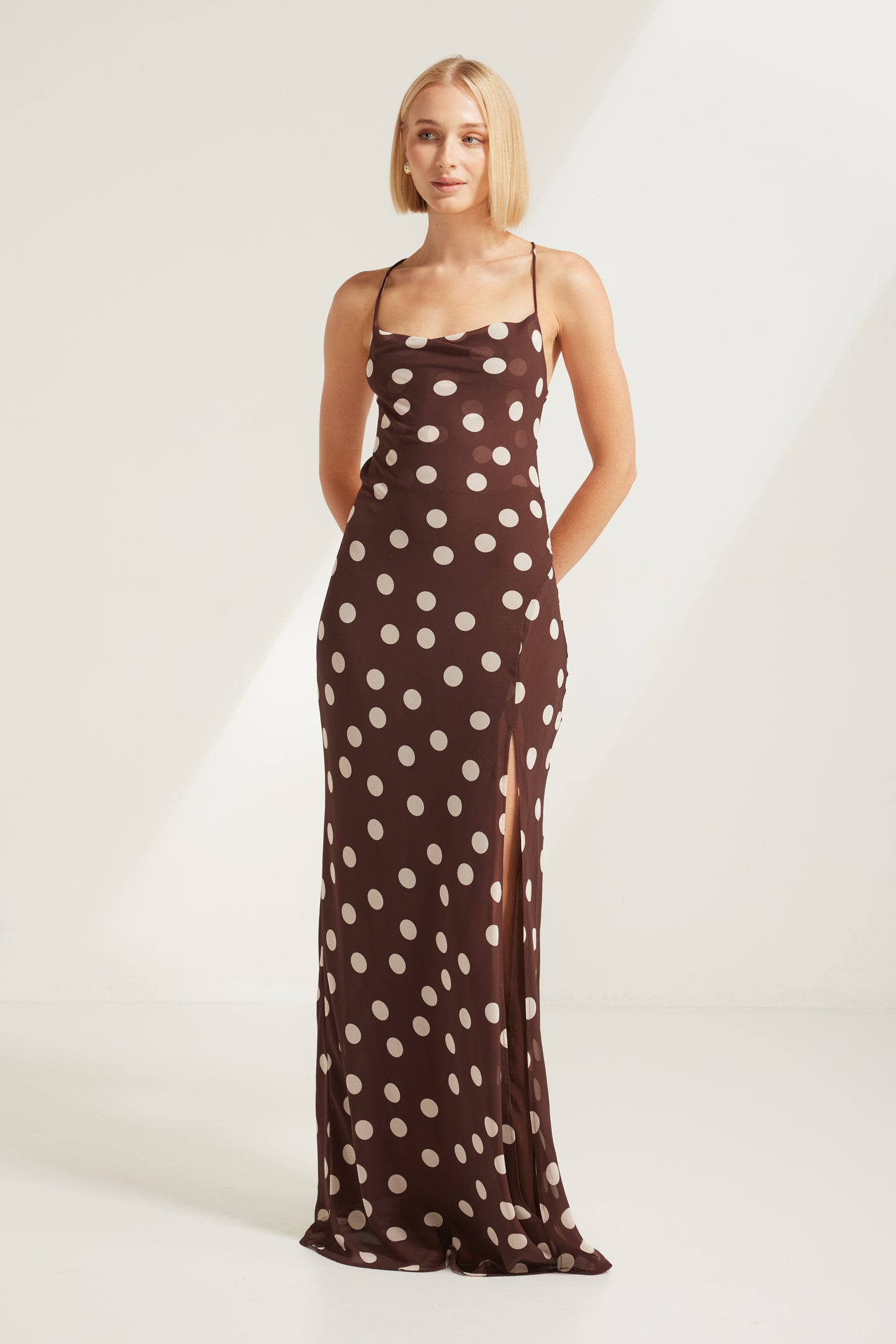 TW4867 Cocoa Dot Edit Backless Maxi Dress in Choco/Beige. Wholesale dresses from Rosebullet The Label, a Melbourne based women's fashion wholesaler and manufacturer. Featuring elevated styles for every occasion, from casual dresses and workwear to parties, events, holidays, and evening wear