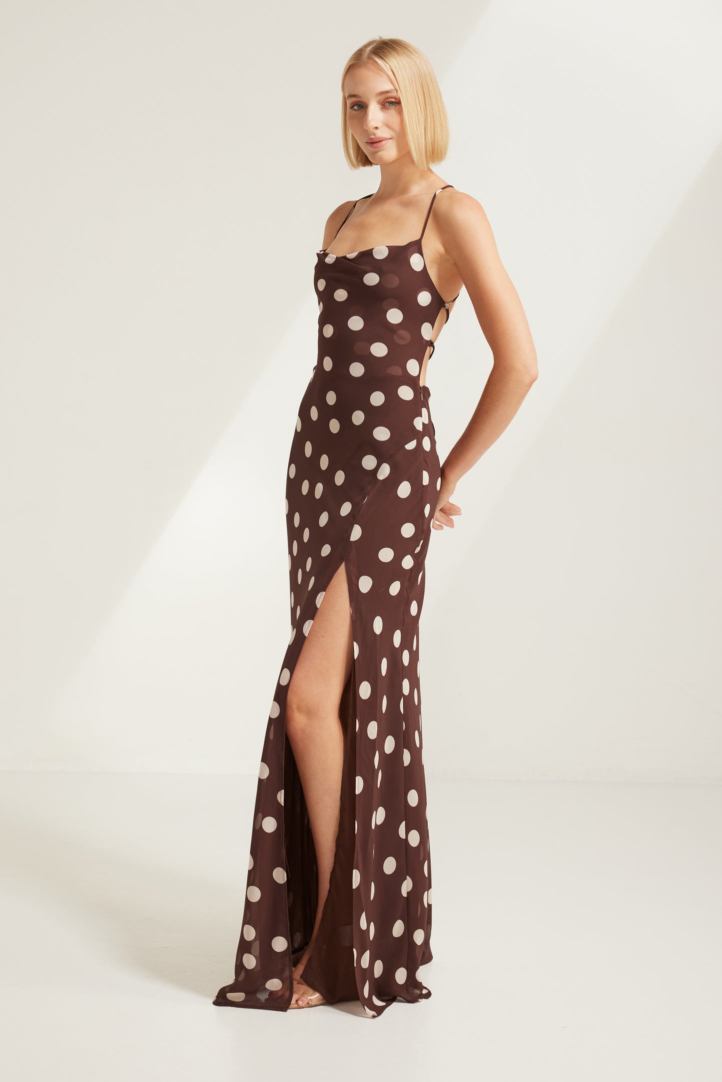 TW4867 Cocoa Dot Edit Backless Maxi Dress in Choco/Beige. Wholesale dresses from Rosebullet The Label, a Melbourne based women's fashion wholesaler and manufacturer. Featuring elevated styles for every occasion, from casual dresses and workwear to parties, events, holidays, and evening wear