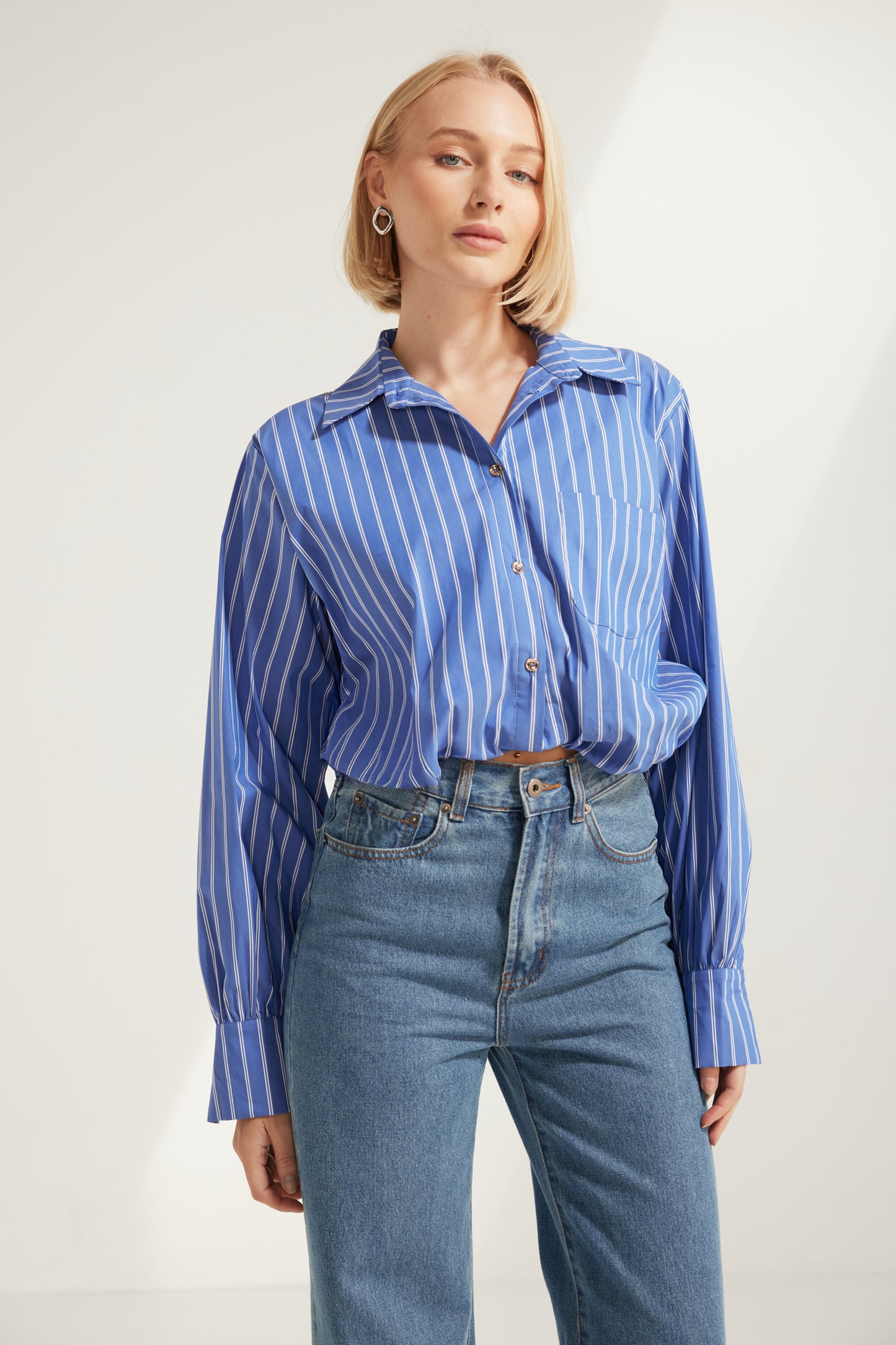 TW4885 Signature Stripe Edit Bubble Hem Shirt in Dark Blue. Australian women’s fashion brand Rosebullet The Label Wholesale Collection, featuring trend driven dresses, tops, pants, skirts, skorts, shorts, knitwear, jumpsuits, playsuits, outerwear, restocked bestsellers, and more for modern boutiques.