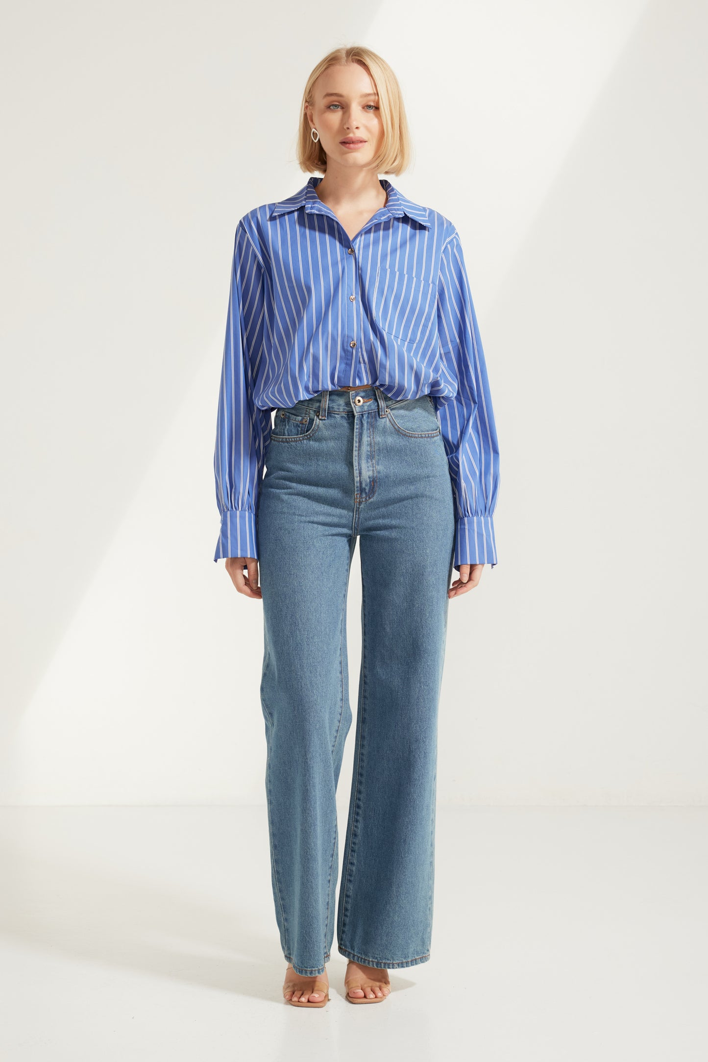 TW4885 Signature Stripe Edit Bubble Hem Shirt in Dark Blue. Australian women’s fashion brand Rosebullet The Label Wholesale Collection, featuring trend driven dresses, tops, pants, skirts, skorts, shorts, knitwear, jumpsuits, playsuits, outerwear, restocked bestsellers, and more for modern boutiques.