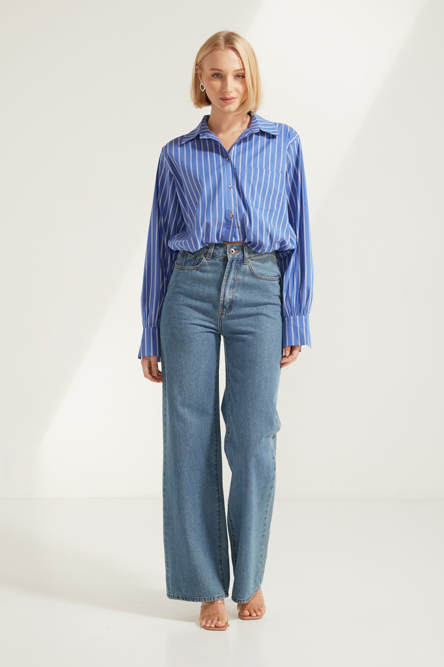 TW4885 Signature Stripe Edit Bubble Hem Shirt in Dark Blue. Australian women’s fashion brand Rosebullet The Label Wholesale Collection, featuring trend driven dresses, tops, pants, skirts, skorts, shorts, knitwear, jumpsuits, playsuits, outerwear, restocked bestsellers, and more for modern boutiques.