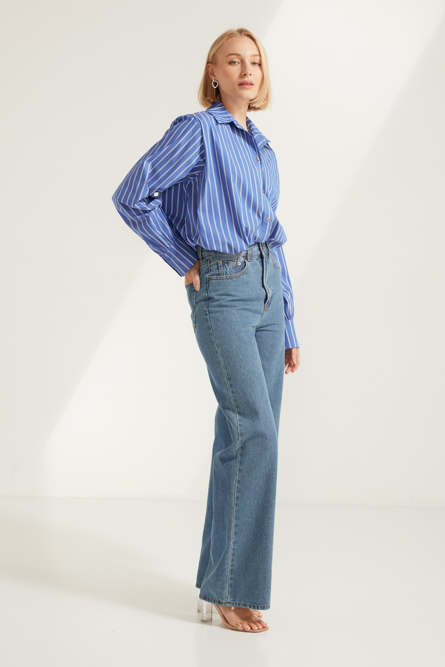 TW4885 Signature Stripe Edit Bubble Hem Shirt in Dark Blue. Australian women’s fashion brand Rosebullet The Label Wholesale Collection, featuring trend driven dresses, tops, pants, skirts, skorts, shorts, knitwear, jumpsuits, playsuits, outerwear, restocked bestsellers, and more for modern boutiques.