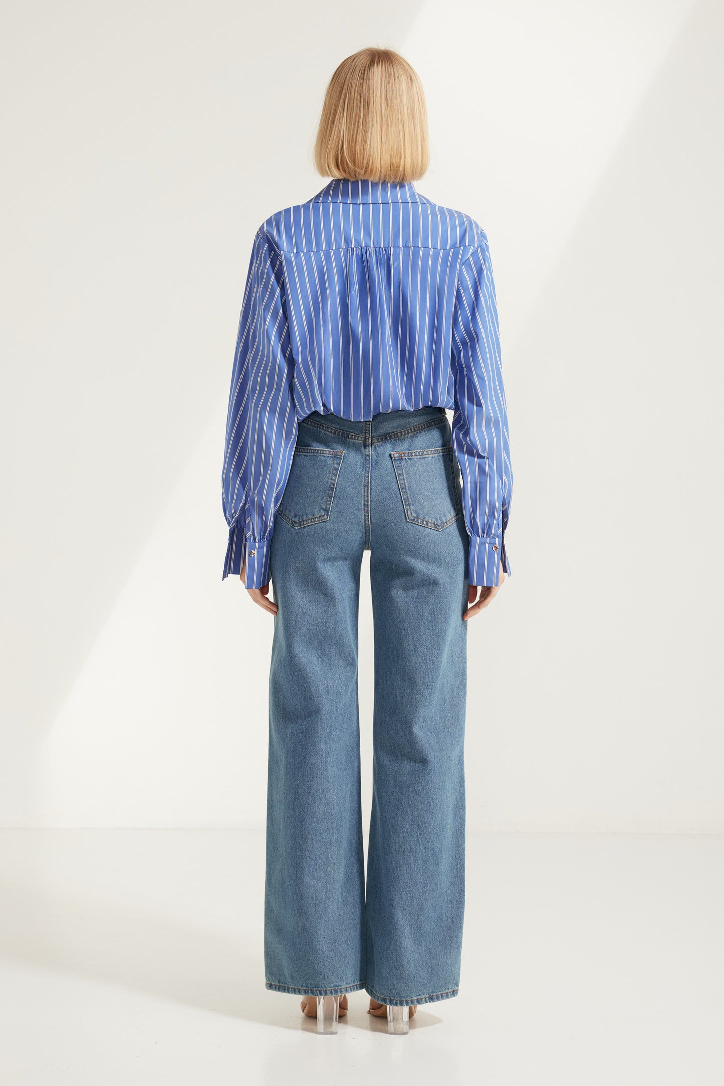 TW4885 Signature Stripe Edit Bubble Hem Shirt in Dark Blue. Australian women’s fashion brand Rosebullet The Label Wholesale Collection, featuring trend driven dresses, tops, pants, skirts, skorts, shorts, knitwear, jumpsuits, playsuits, outerwear, restocked bestsellers, and more for modern boutiques.