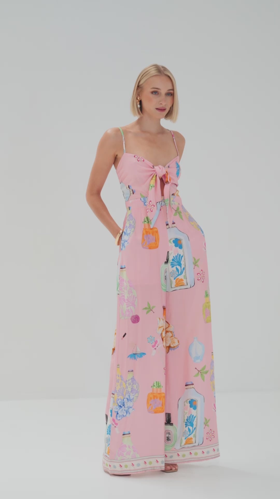 TW3813K Perfume Dreams Jumpsuit Pink Print. Australian women’s WHOLESALE PLAYSUITS/JUMPSUITS fashion from Rosebullet the label. Rayon Playsuit